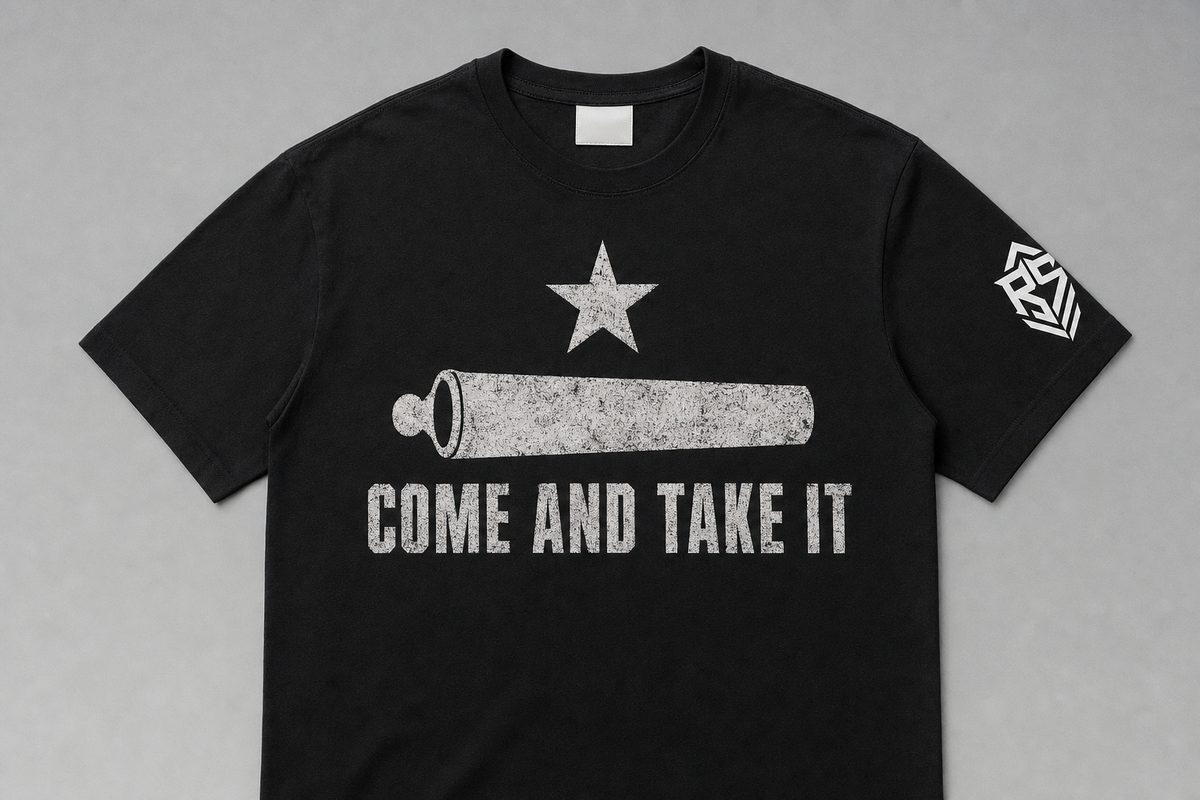 Black Reap and Sow t-shirt with the Texas Gonzales come and take it flag, a lone star above a cannon