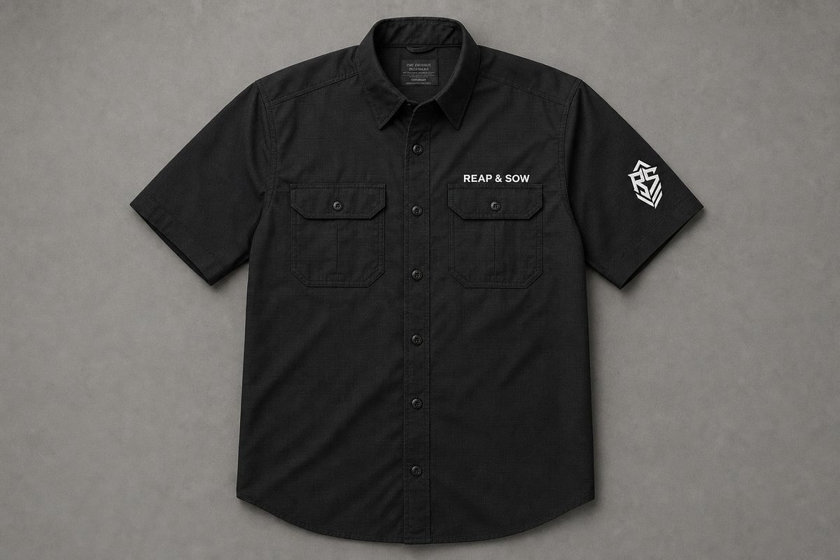 Black Reap and Sow ripstop short sleeve field work shirt with two chest pockets and the RS monogram on the sleeve