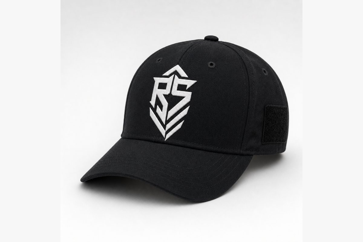 Black Reap and Sow structured cap with the white RS monogram embroidered on the front and a side loop panel